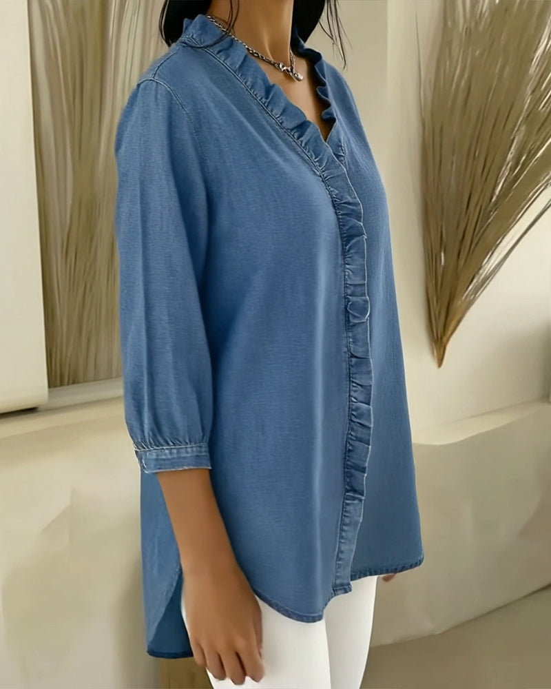 Elvaria | Elegante blusa con detalles de volantes