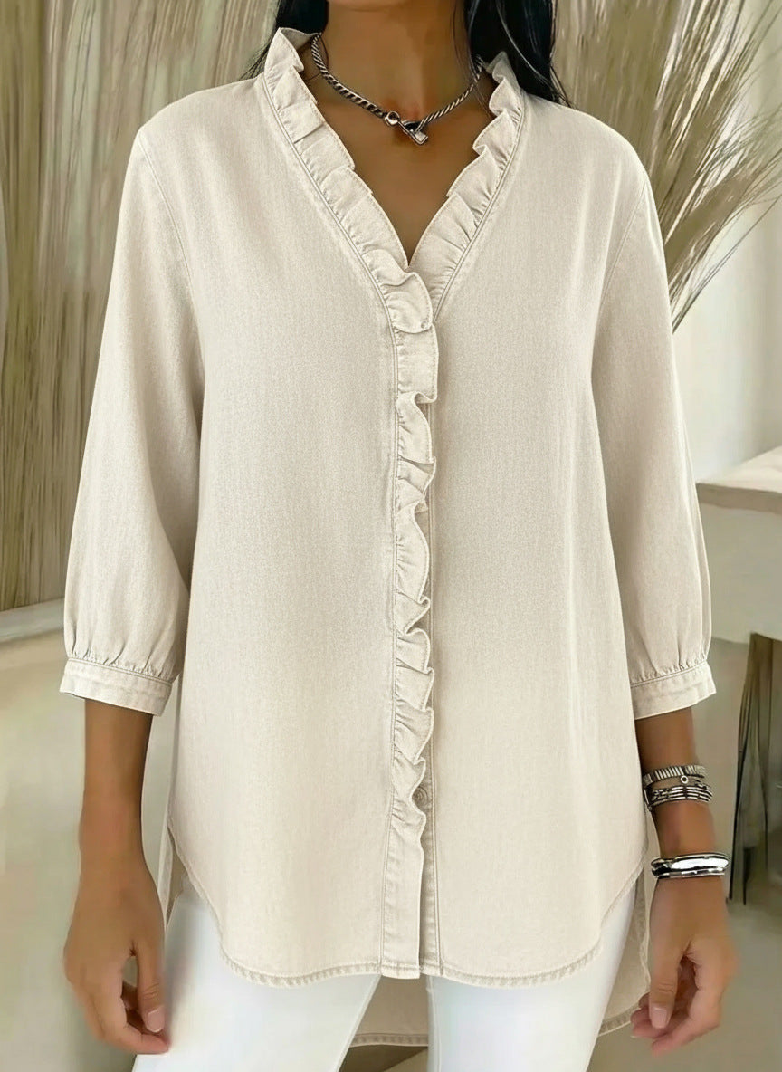 Elvaria | Elegante blusa con detalles de volantes