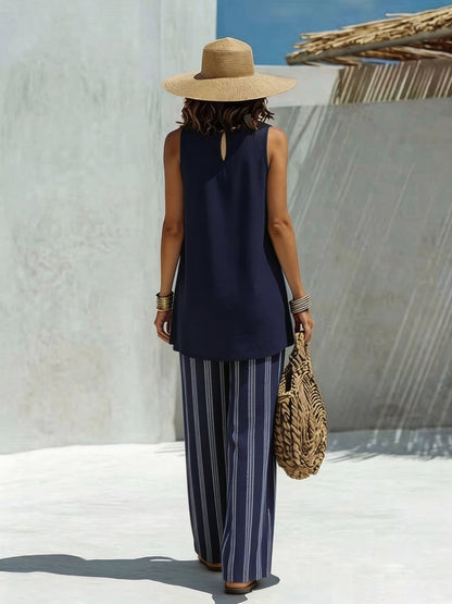 Lente/Zomer Dames Vakantiestijl Marineblauwe Mouwloze Onregelmatige Top + Hoge Taille Gestreepte Wijdvallende Broek met Wijde Pijpen Casual 2-delige Set, Geschikt voor Dagelijks Gebruik en op Vakantie 2A12590