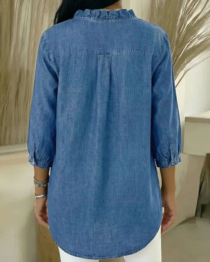 Elvaria | Elegante blusa con detalles de volantes