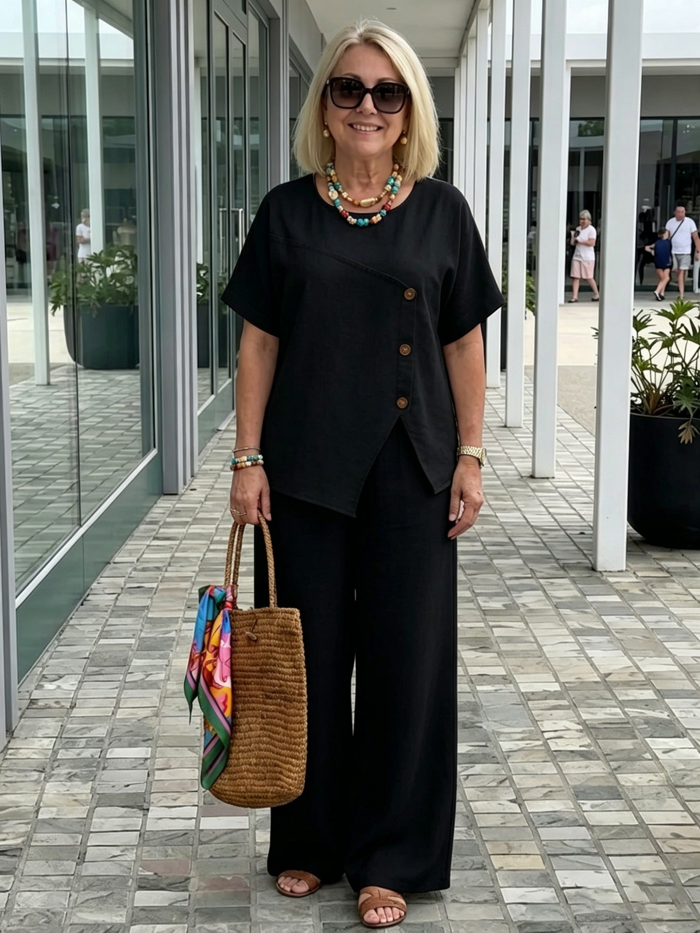 Dames lente/zomer nieuwe modieuze casual set, linnen asymmetrische knopdecoratieve top, tweedelige broek met wijde pijpen