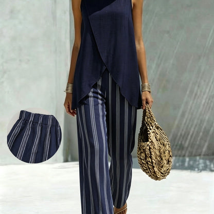 Lente/Zomer Dames Vakantiestijl Marineblauwe Mouwloze Onregelmatige Top + Hoge Taille Gestreepte Wijdvallende Broek met Wijde Pijpen Casual 2-delige Set, Geschikt voor Dagelijks Gebruik en op Vakantie 2A12590