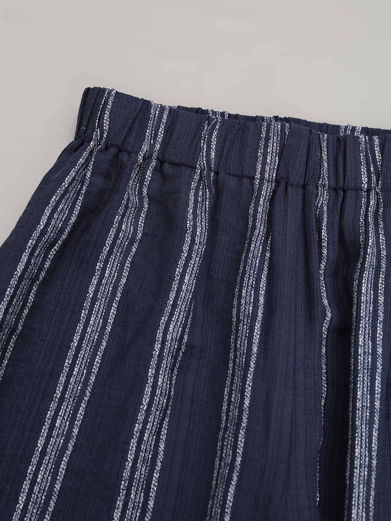 Lente/Zomer Dames Vakantiestijl Marineblauwe Mouwloze Onregelmatige Top + Hoge Taille Gestreepte Wijdvallende Broek met Wijde Pijpen Casual 2-delige Set, Geschikt voor Dagelijks Gebruik en op Vakantie 2A12590